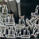 Many different sizes and shapes of aluminum profiles.