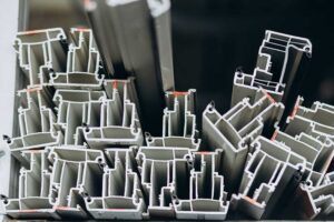 Many different sizes and shapes of aluminum profiles.
