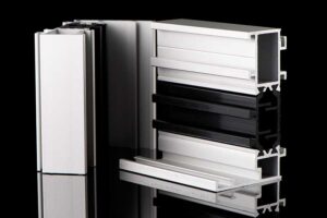 Aluminium profile sample isolated on black background.